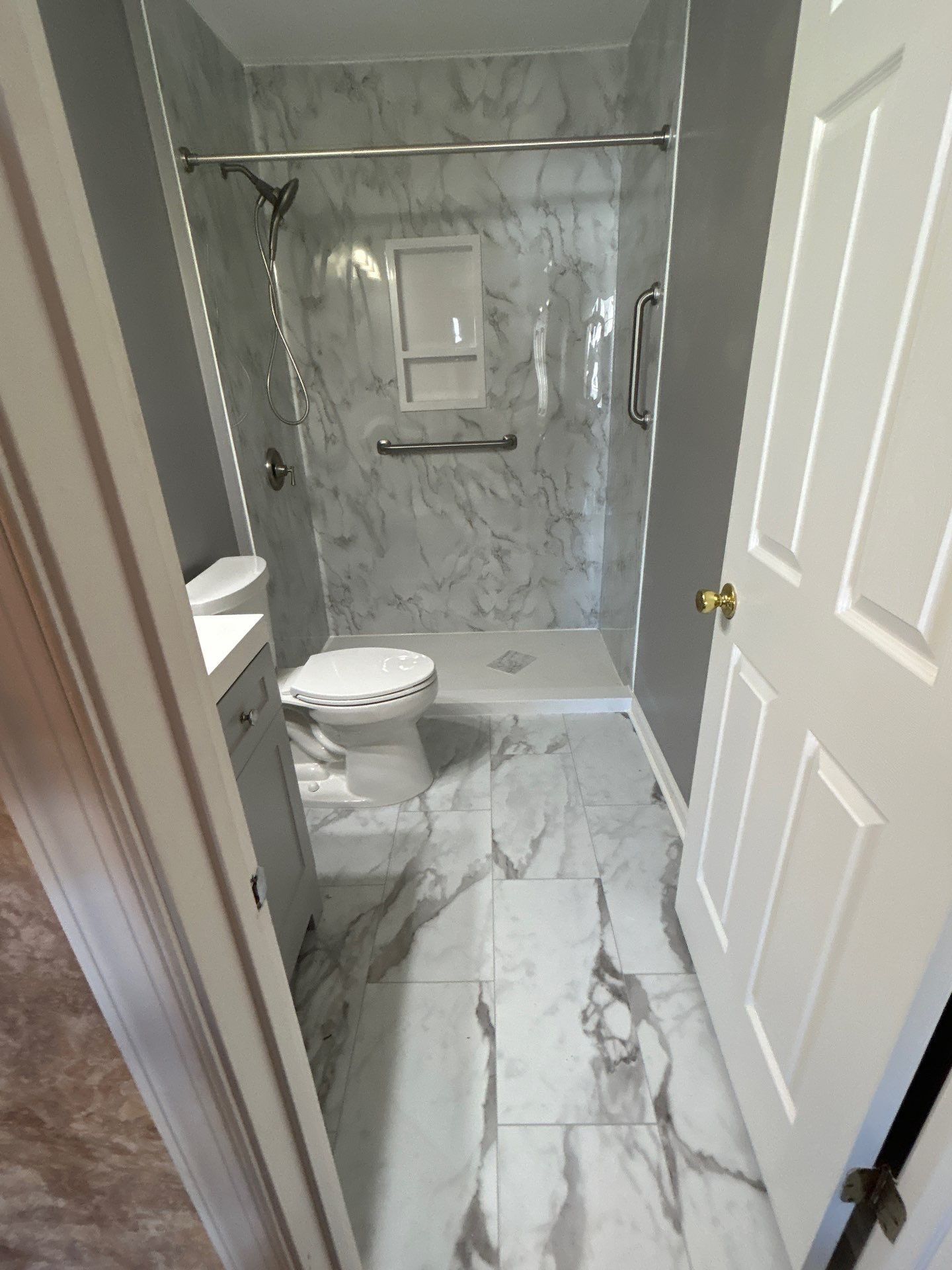 Marble bathroom remodel by Elixtro Renovations